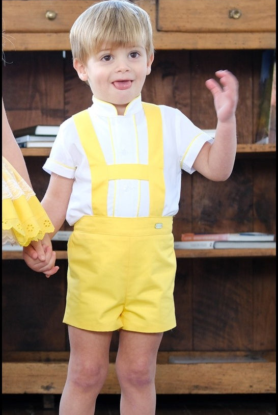 Little Boy wearing yellow H-bar shorts set with cream shirt by Sonata Infantil, Spanish children's outfit UK