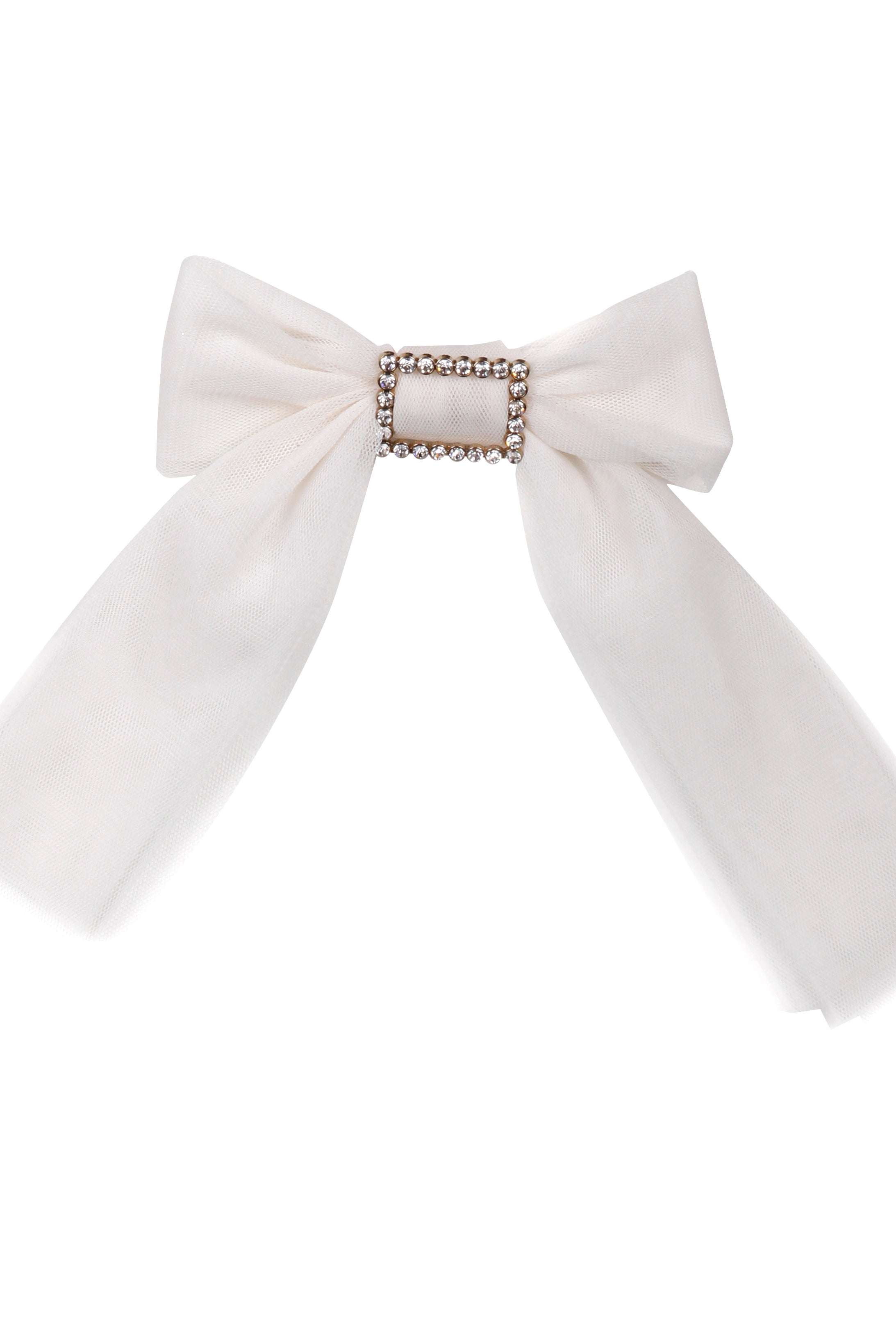 A white bow accessory with a rectangular metal frame embellished with small clear rhinestones, set against a solid white background.