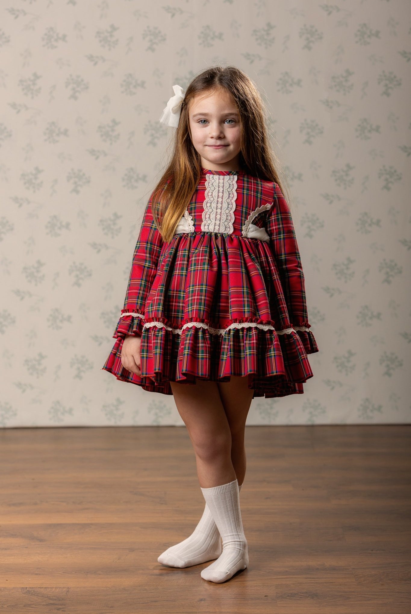 Abuela Tata girls red tartan Christmas dress with ivory lace and matching tartan headpiece AW26