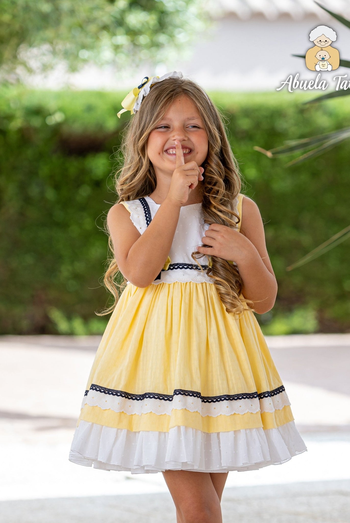 Abuela Tata SS26 girls yellow navy & white dress with matching headpiece
