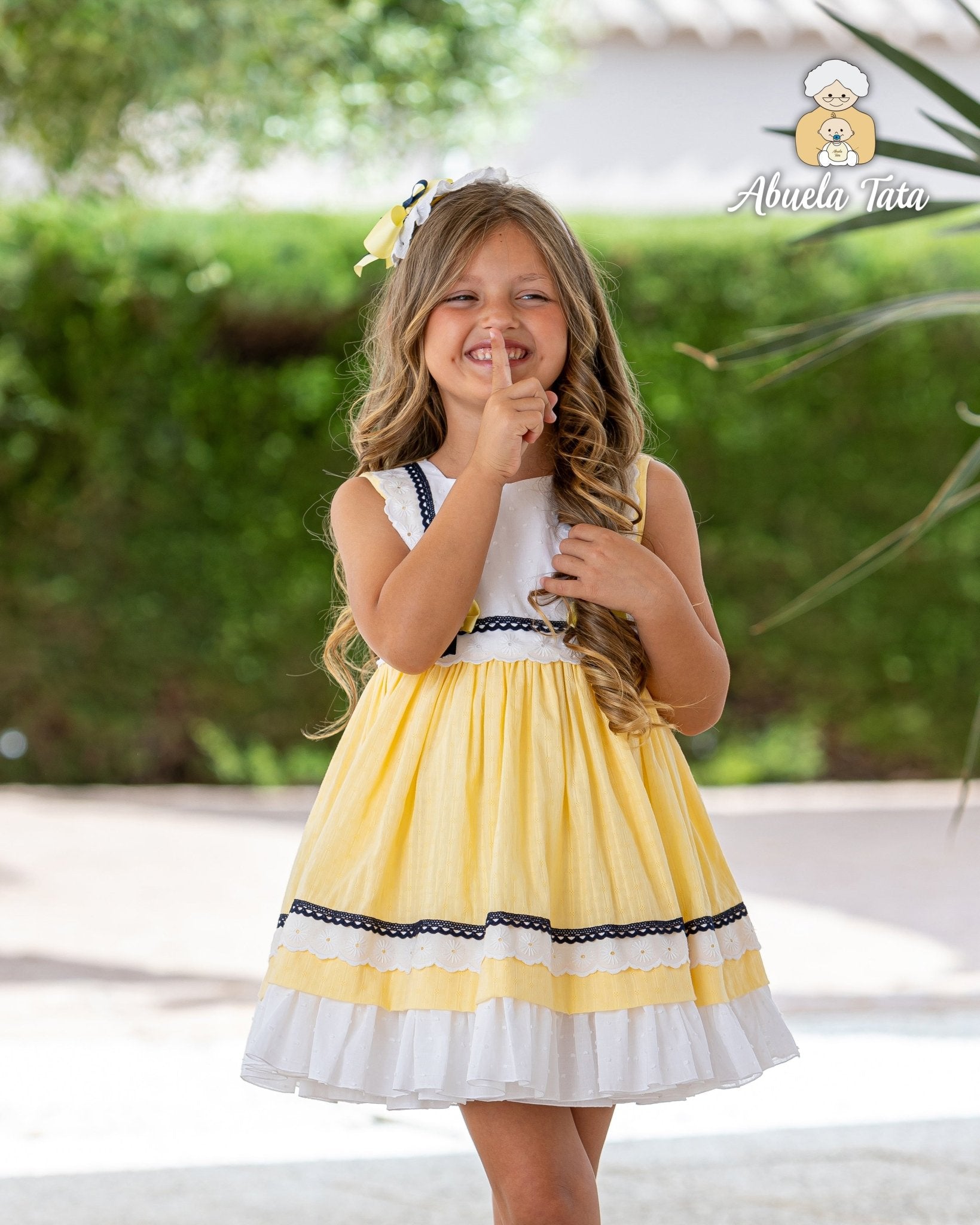 Abuela Tata SS26 girls yellow navy & white dress with matching headpiece