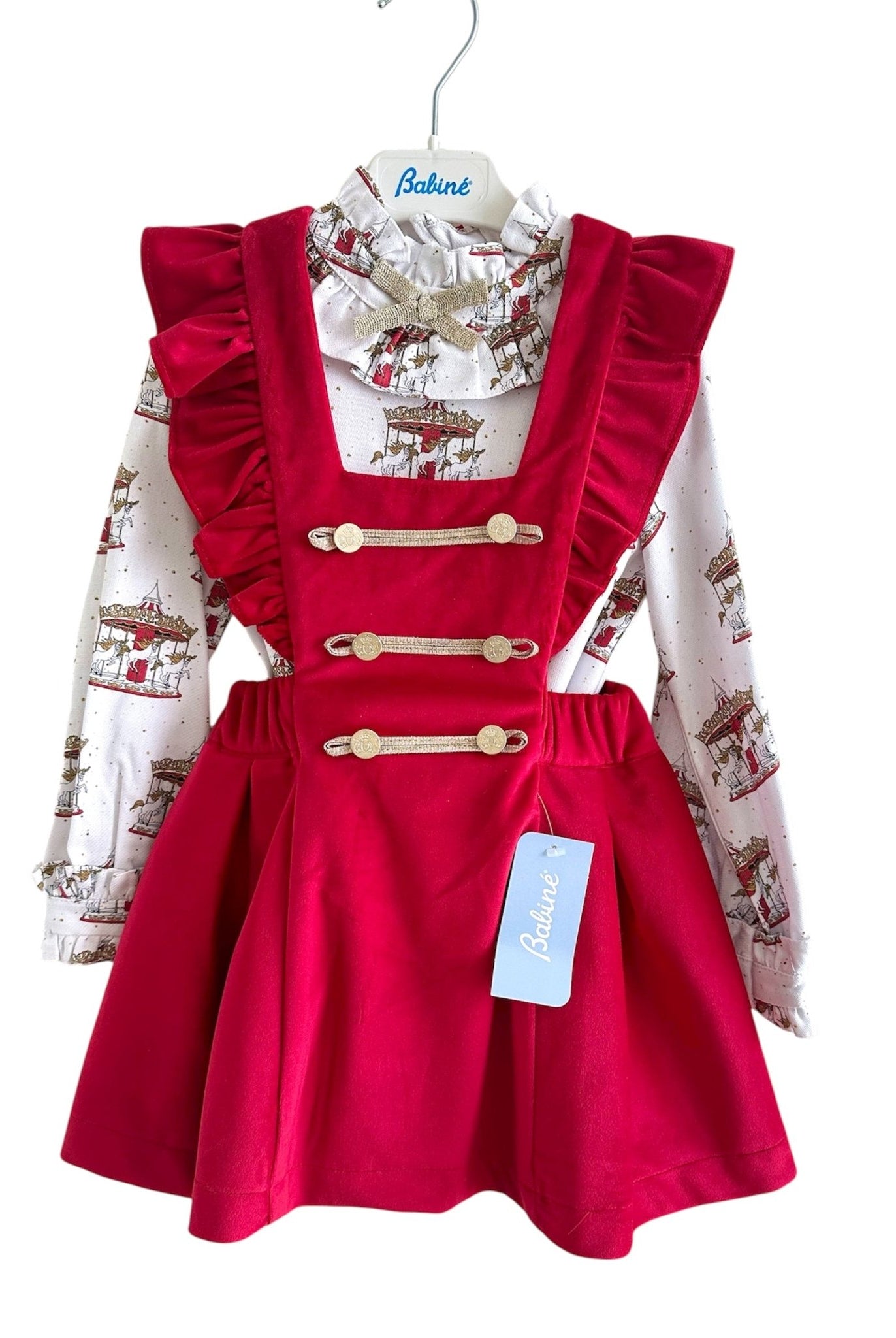 Perfect for Christmas girls red velvet pinafore dress with gold detailing and matching christmas print carousel blouse.