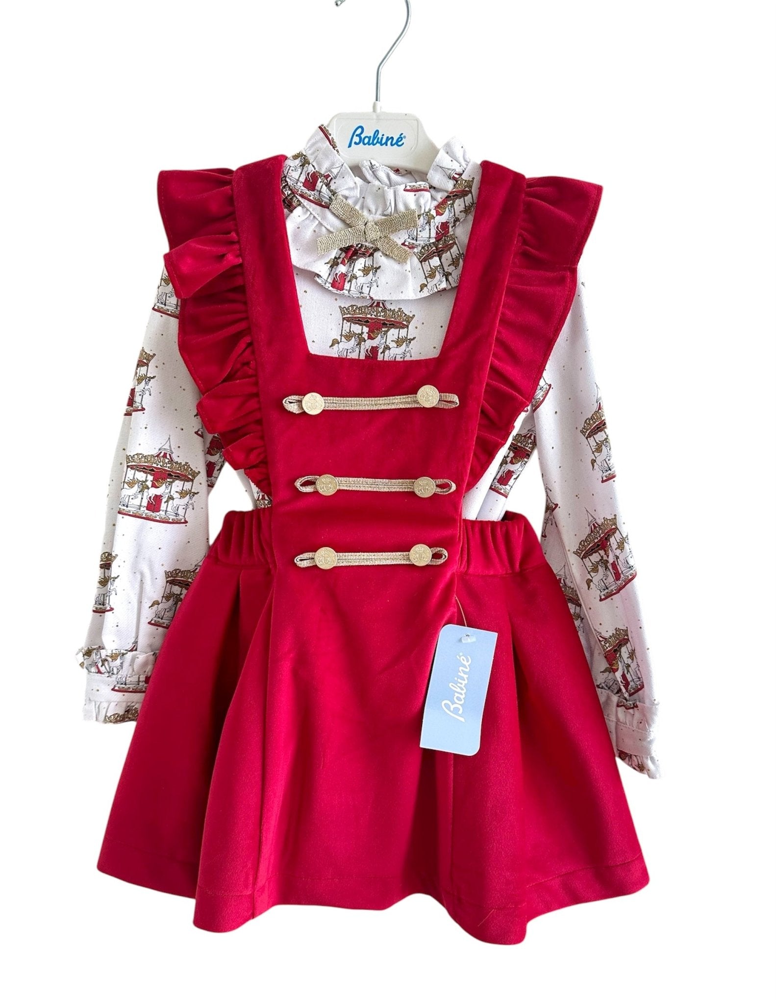Perfect for Christmas girls red velvet pinafore dress with gold detailing and matching christmas print carousel blouse.