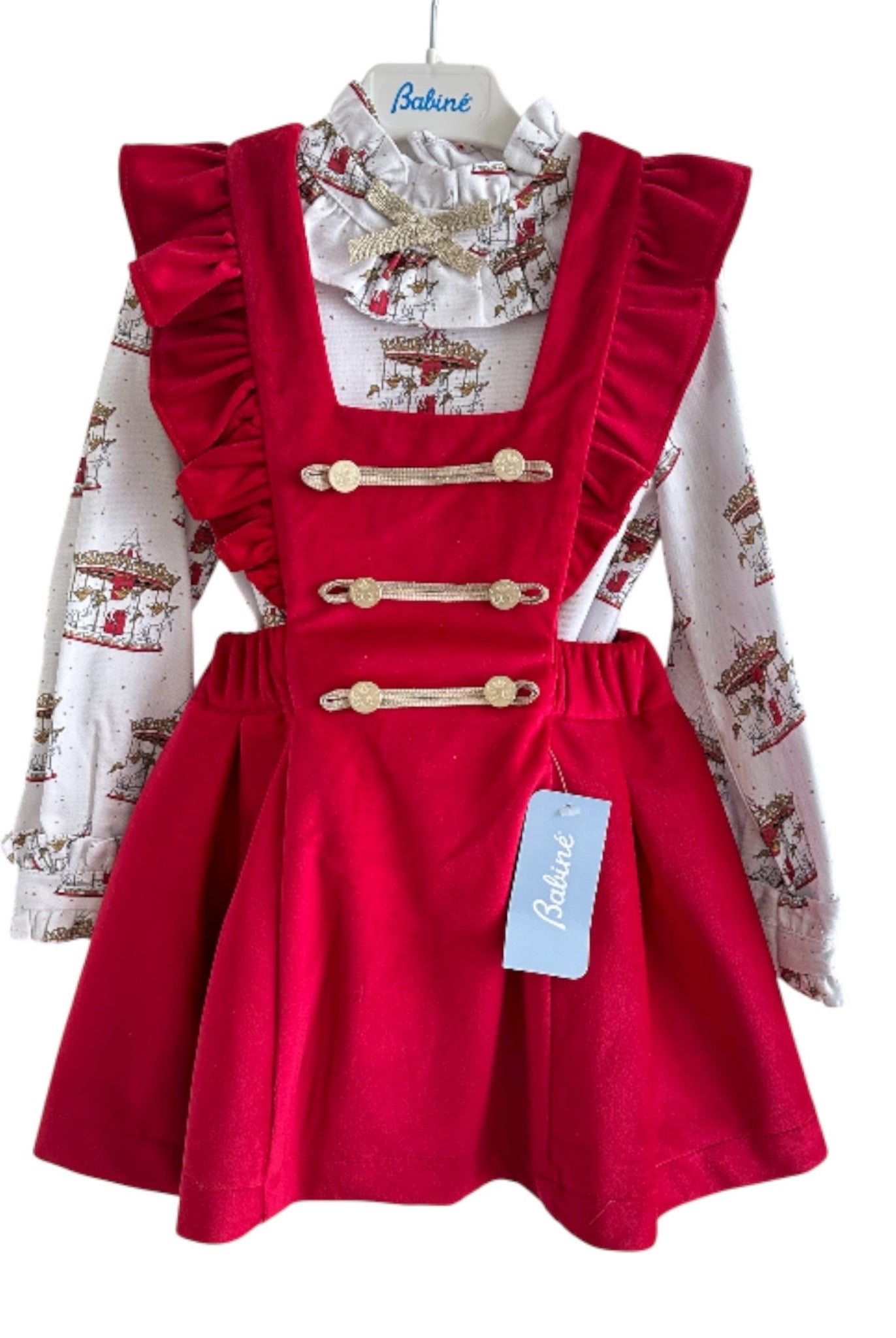 Perfect for Christmas girls red velvet pinafore dress with gold detailing and matching christmas print carousel blouse.