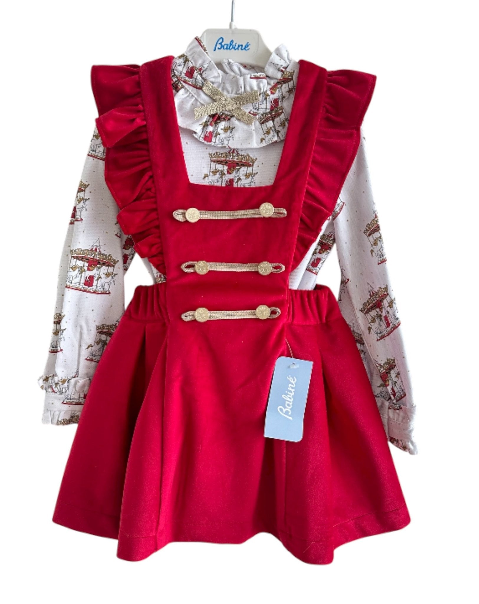 Perfect for Christmas girls red velvet pinafore dress with gold detailing and matching christmas print carousel blouse.