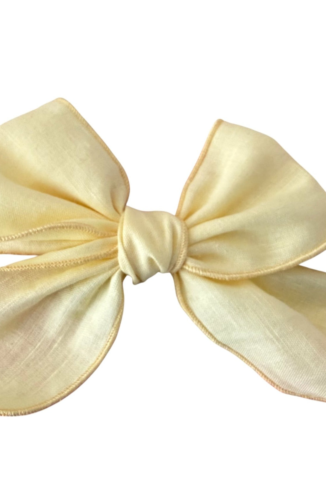 Lemon yellow girls hair bow accessory, perfect for Spanish children's outfits and summer occasion wear.