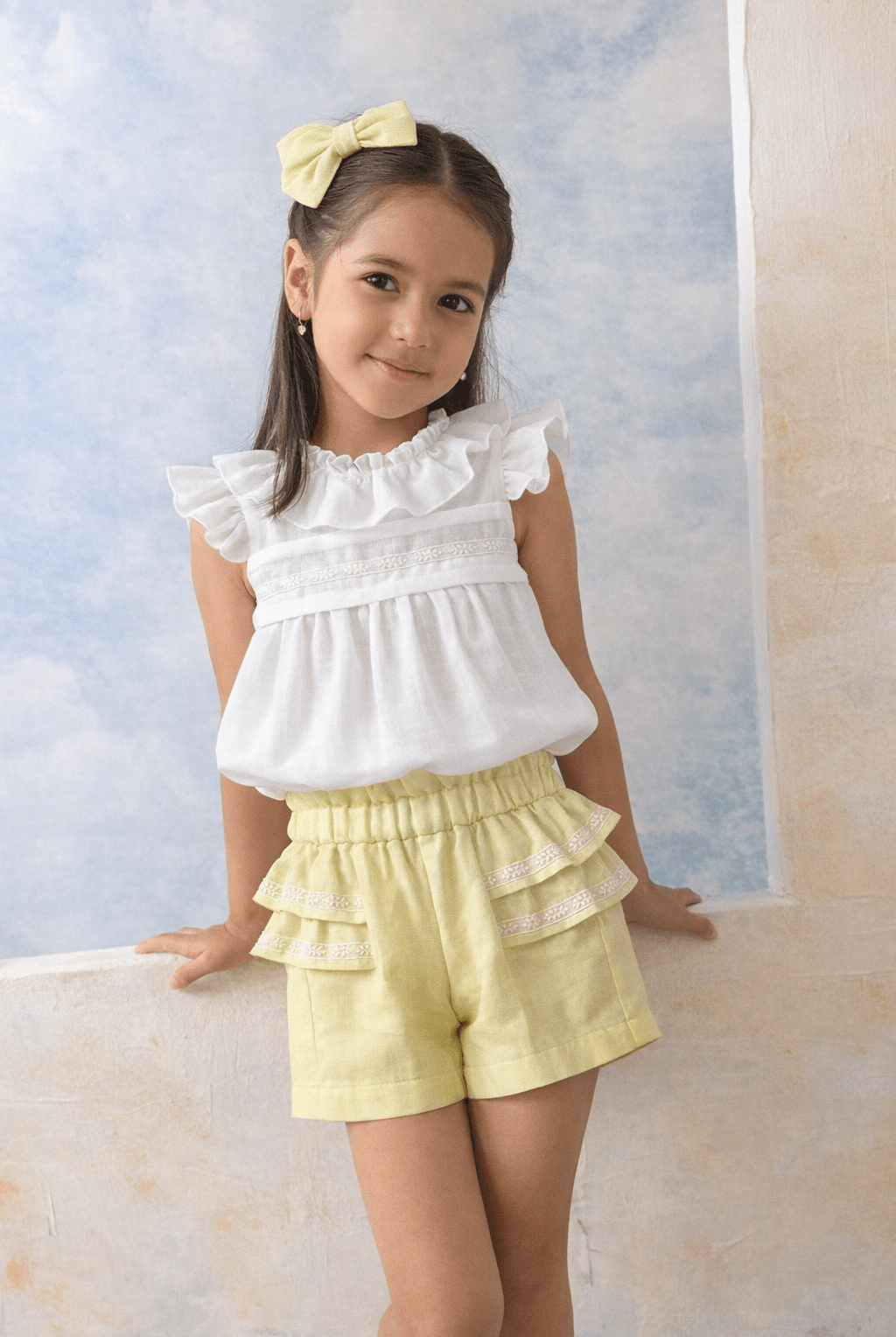Basmarti girls yellow shorts set with ivory ruffle blouse, Spanish children's wear SS26 outfit for girls aged 3–8 years.