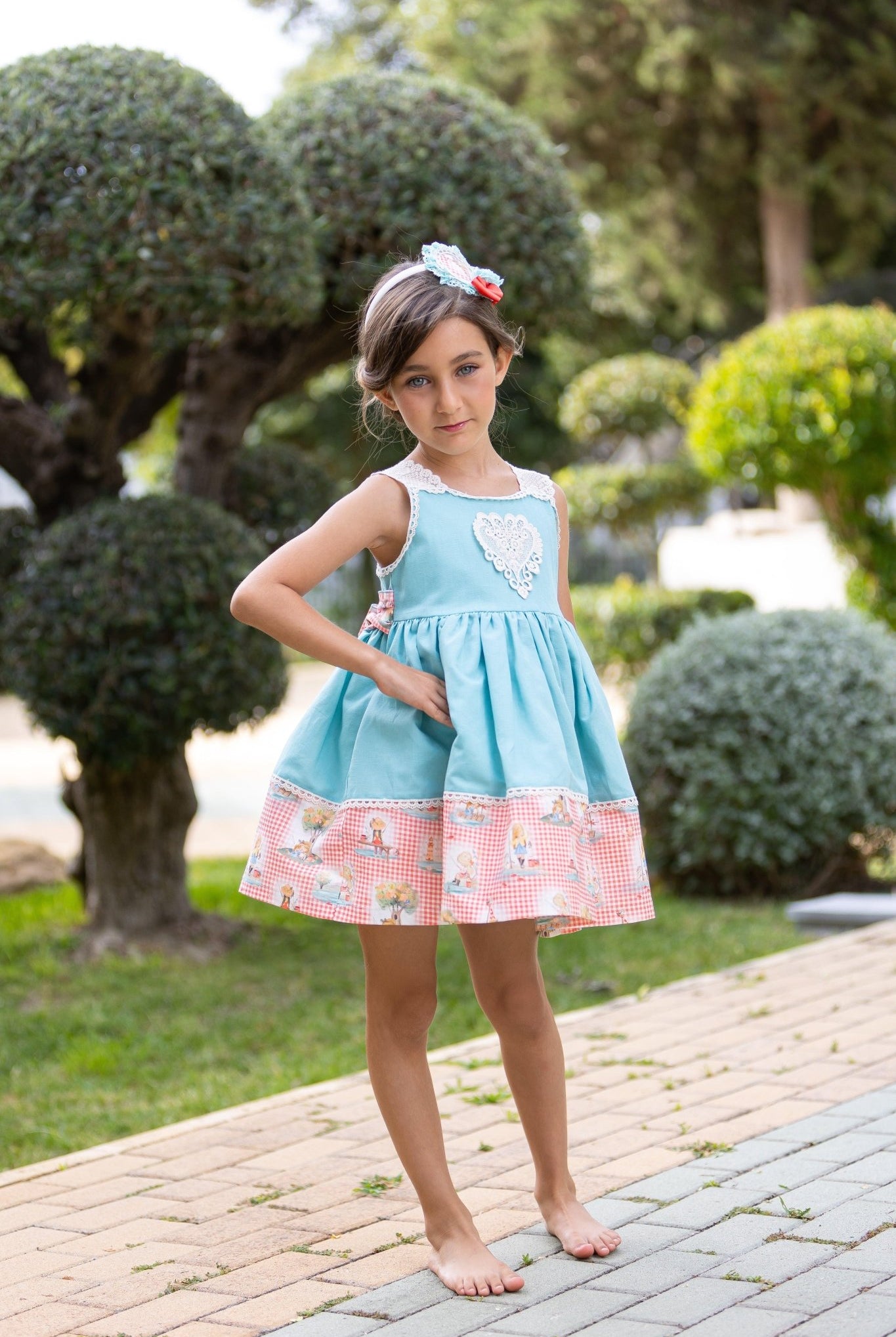 CLEARANCE SALE - Abuela Tata SS24 - Girls Turquoise Blue Dress with Printed Hem 352 - Mariposa Children's Boutique