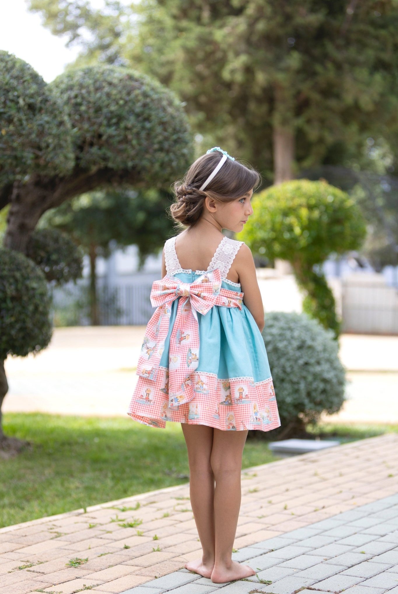 CLEARANCE SALE - Abuela Tata SS24 - Girls Turquoise Blue Dress with Printed Hem 352 - Mariposa Children's Boutique