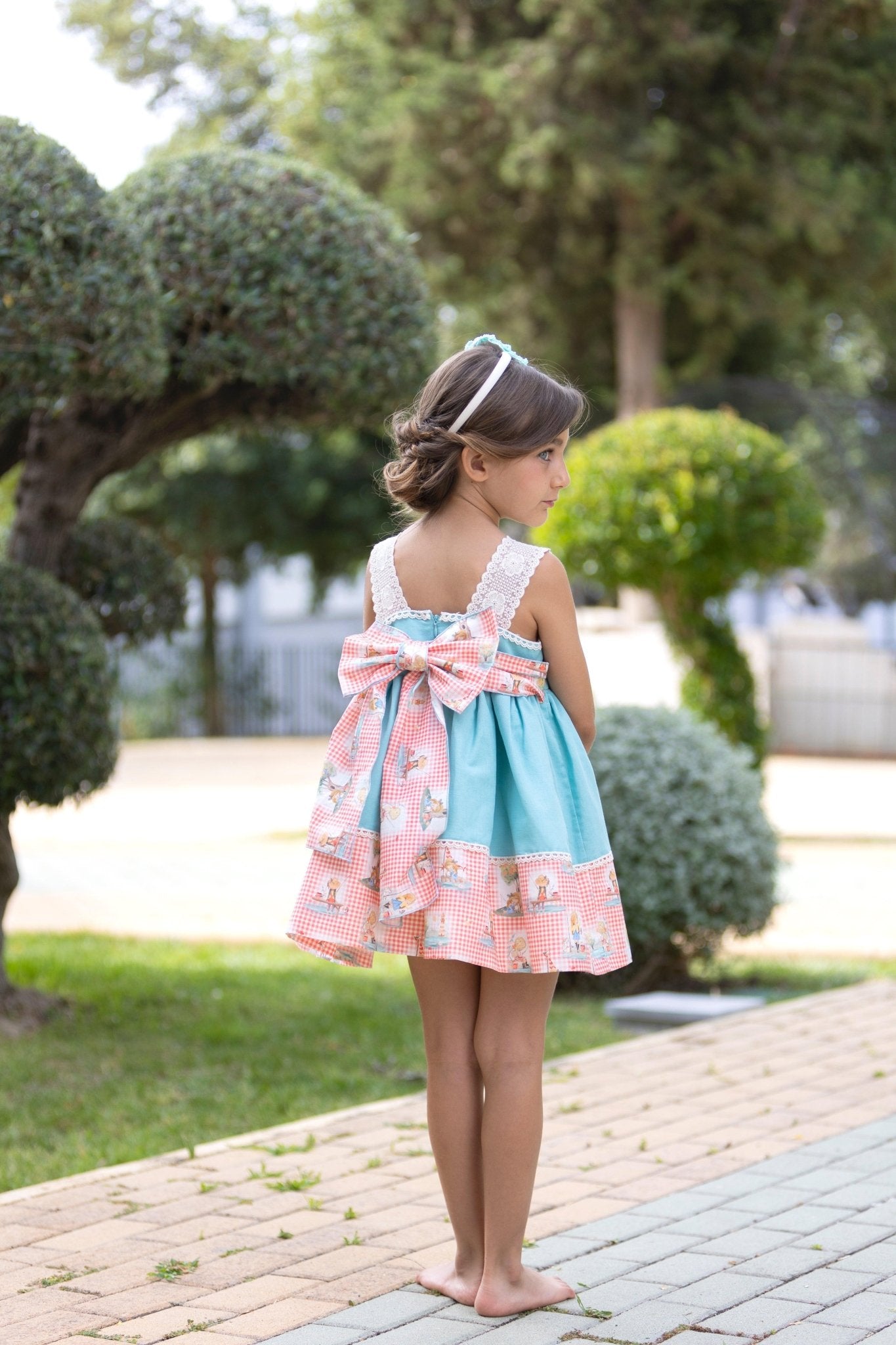 CLEARANCE SALE - Abuela Tata SS24 - Girls Turquoise Blue Dress with Printed Hem 352 - Mariposa Children's Boutique