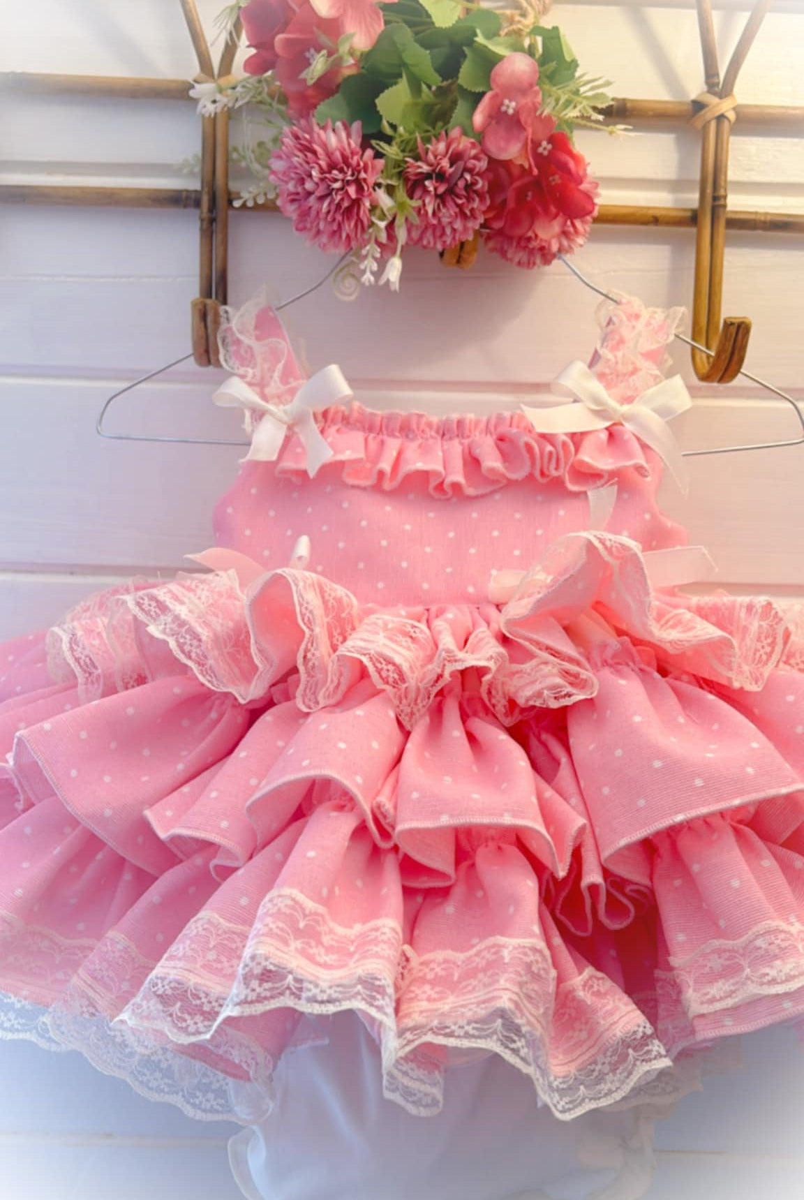 Ela Confeccion Girls Spanish Summer Pink and Cream Polka Dot Dress with matching hair clip.