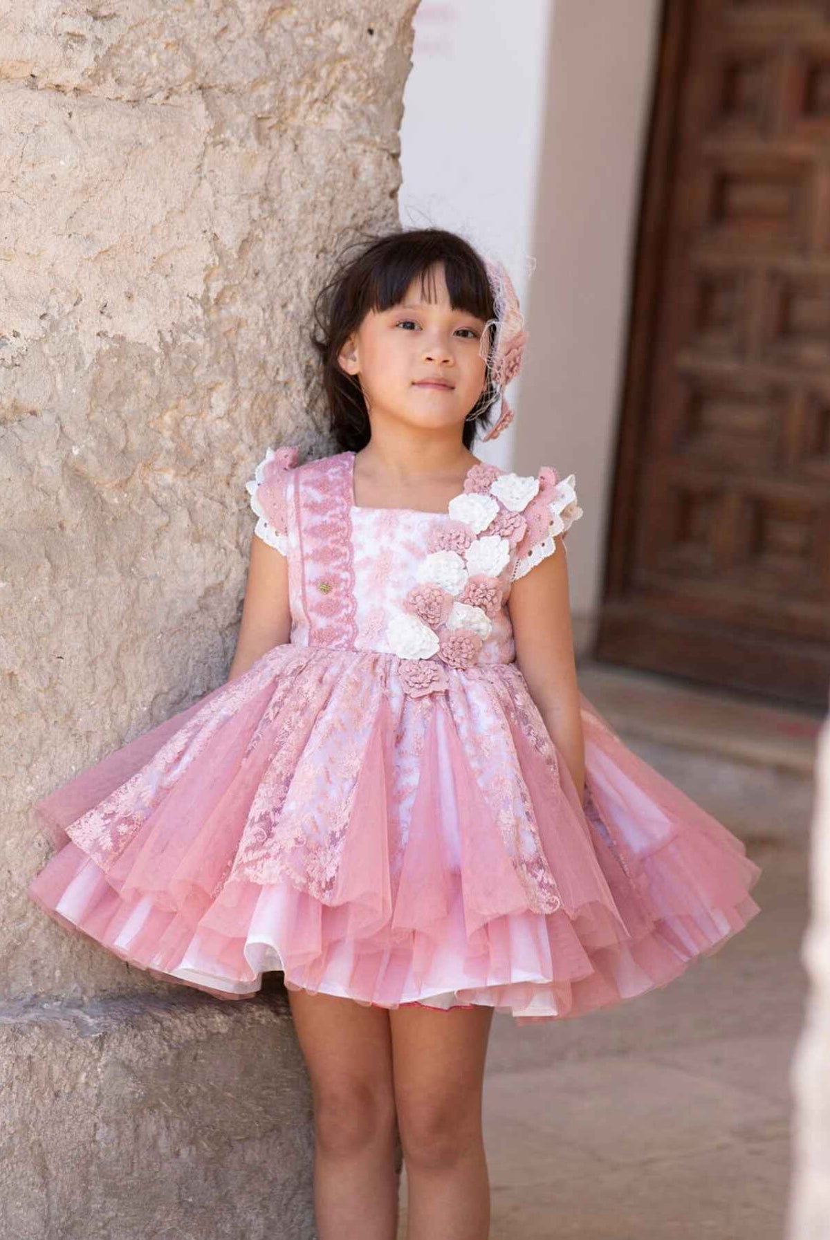 Girls cream and dusky pink occasion dress by Meriche, made in Spain.