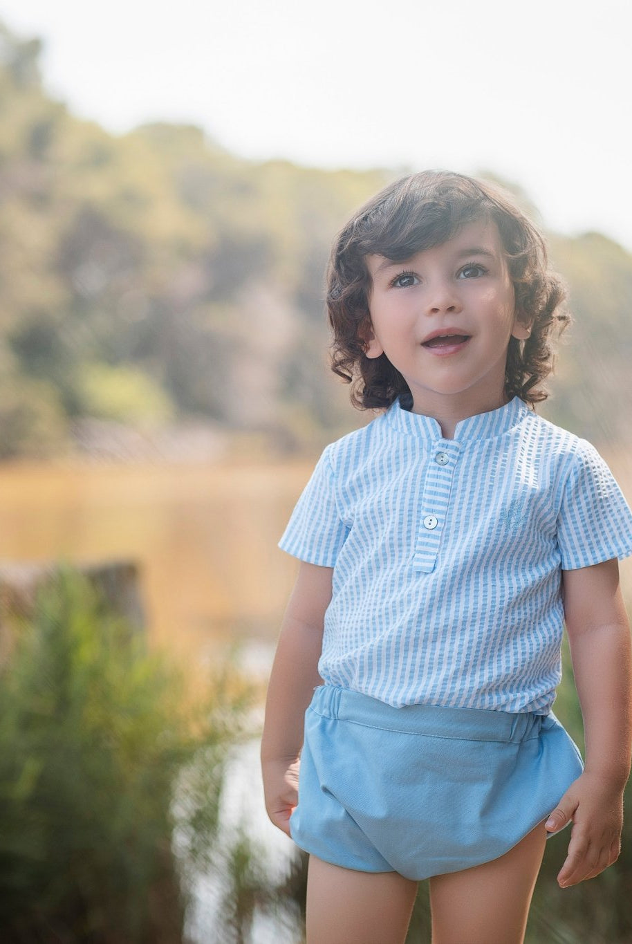 Little boys wearing Rochy SS26 Baby Blue Shorts & Shirt Set.