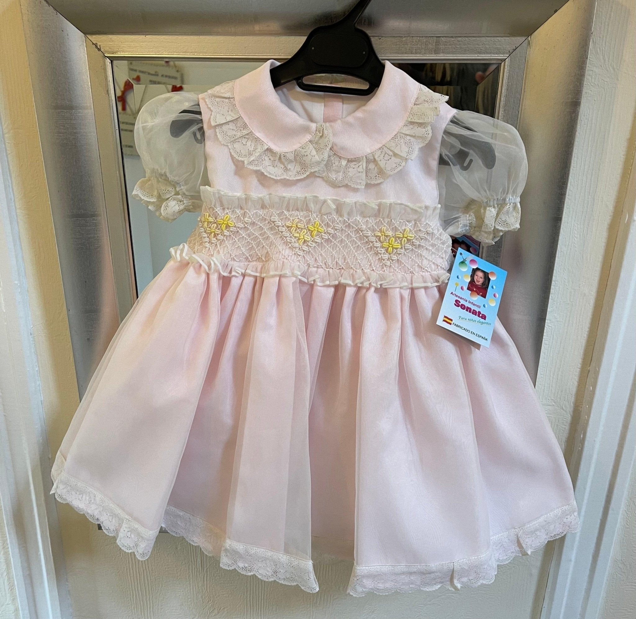 Sonata Girl's pink, cream, and lemon smocked Tulle dress handmade in Spain