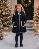 Be Chic girls navy bouclé coat with ivory trim and ivory velvet bow luxury Portuguese children's coat AW26