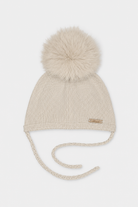 Martin Aranda beige knitted baby pom pom hat with faux fur pom pom made in Spain AW26