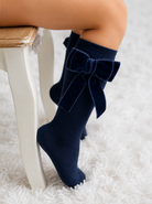 Meia Pata girls navy velvet bow knee high socks for the Be Chic Navy AW26 Collection