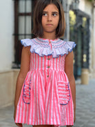 La Peppa SS26 Baby Girl's Neon Pink Striped Dress with Smocked Collar Detail. 