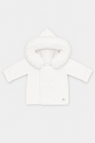 A white knit baby coat with a plush faux-fur trimmed hood, shown flat against a light gray background.