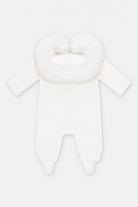 A white knit baby footed jumpsuit with a fluffy faux-fur hood, shown against a plain white background.