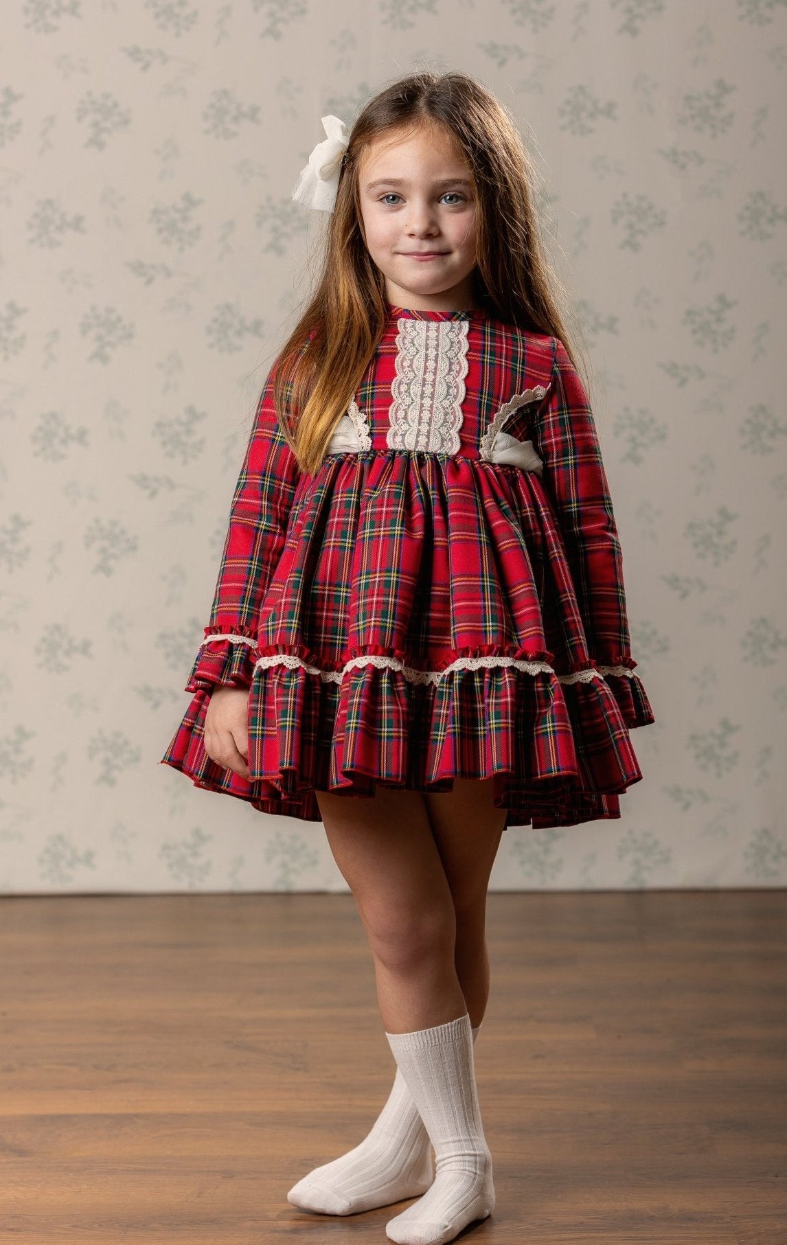 Abuela Tata girls red tartan Christmas dress with ivory lace and matching tartan headpiece AW26
