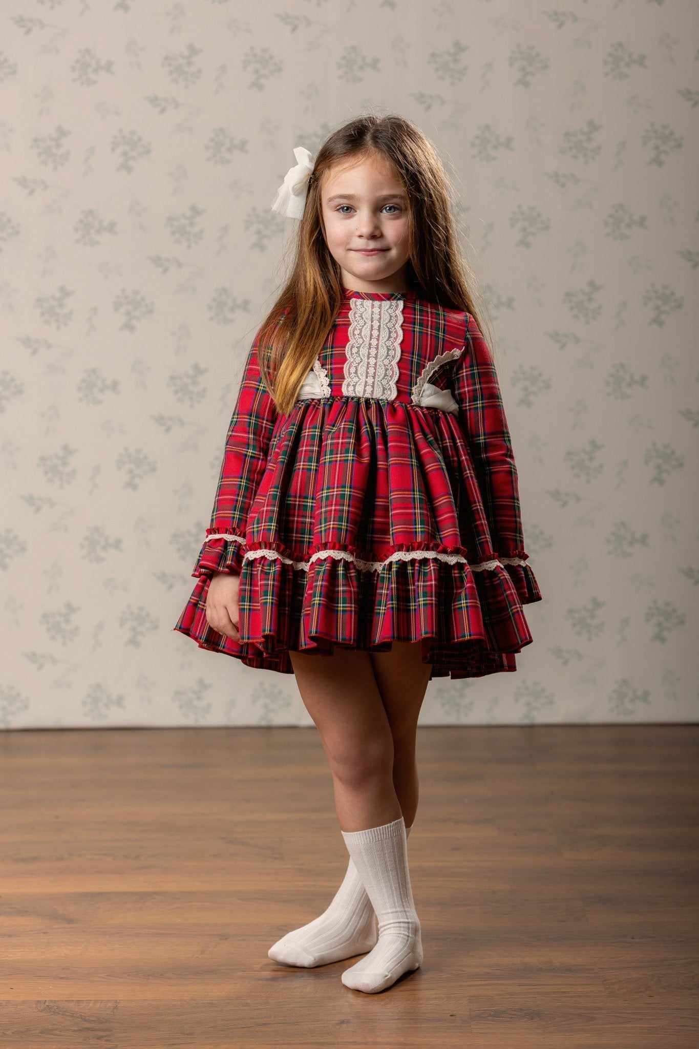 Abuela Tata girls red tartan Christmas dress with ivory lace and matching tartan headpiece AW26