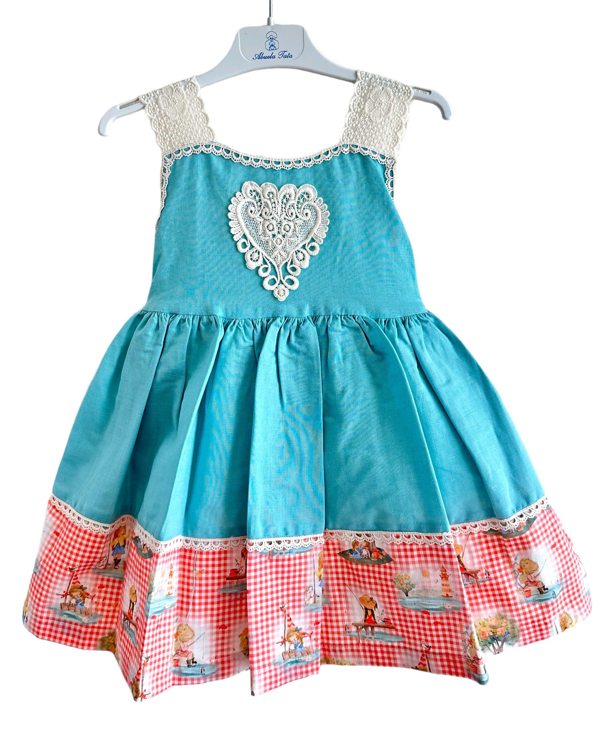 Abuela Tata SS24 - Girls Turquoise Blue Dress with Printed Hem 352 - Mariposa Children's Boutique