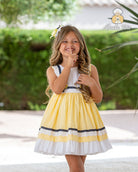Abuela Tata SS26 girls yellow navy & white dress with matching headpiece 