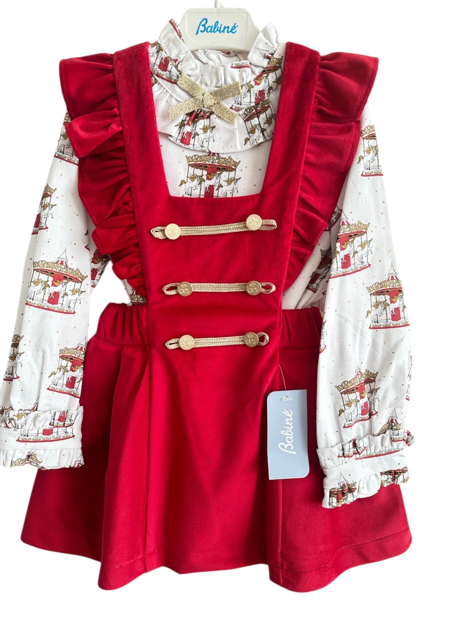 Perfect for Christmas girls red velvet pinafore dress with gold detailing and matching christmas print carousel blouse. 