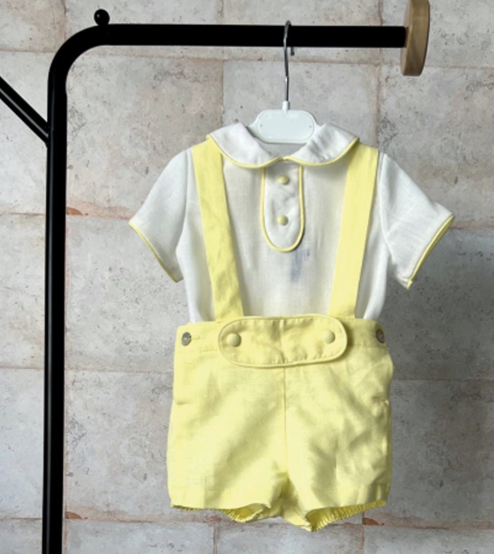 Basmarti SS26 baby boys Spanish outfit with white Peter Pan collar shirt and lemon yellow suspender shorts, traditional summer set for babies 3–48 months.