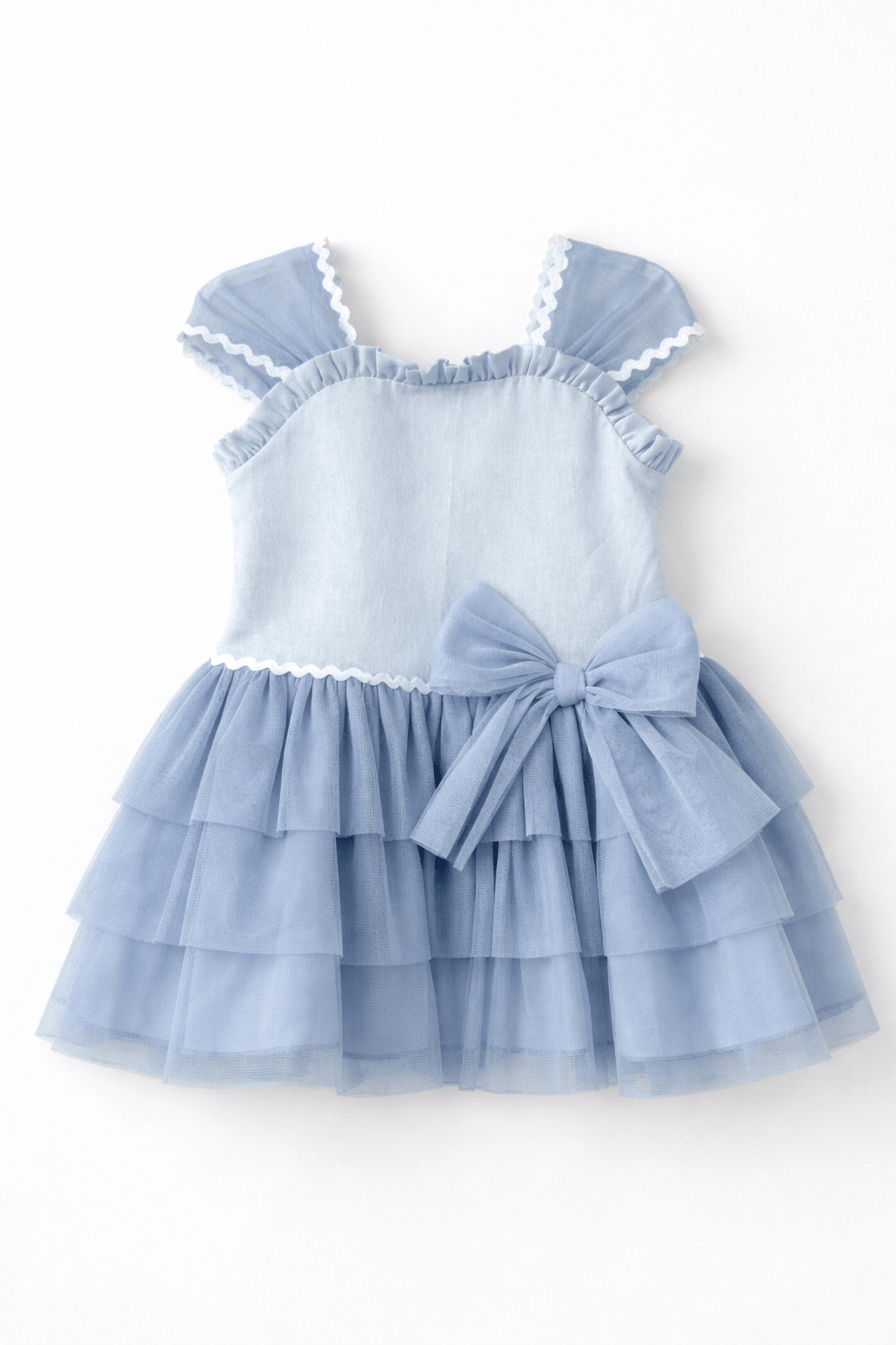 Basmarti SS26 Camelia blue girls Spanish dress with layered tulle skirt and bow detail