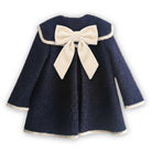 Be Chic girls navy bouclé coat with ivory trim and ivory velvet bow luxury Portuguese children's coat AW26