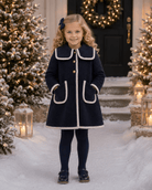 Be Chic girls navy bouclé coat with ivory trim and ivory velvet bow luxury Portuguese children's coat AW26