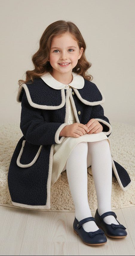 Be Chic girls navy bouclé coat with ivory trim and ivory velvet bow luxury Portuguese children's coat AW26