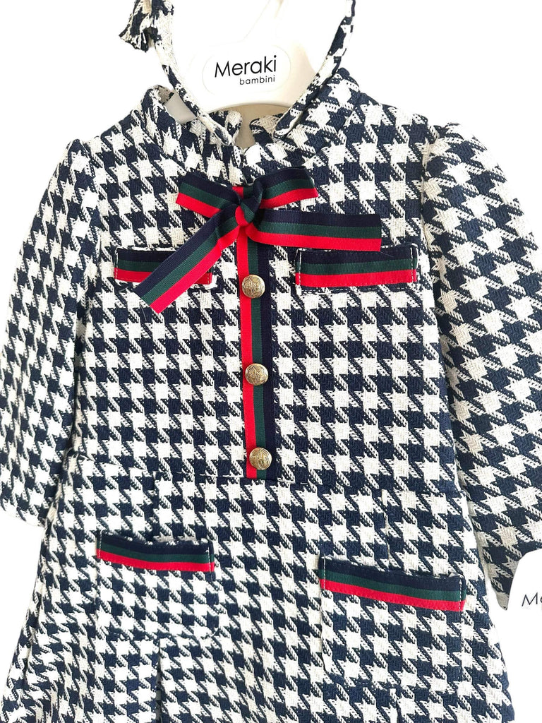Meraki Bambini AW23 - Girls Navy Houndstooth Dress with Red, Navy & Green Detail Bow & Matching Headpiece - Mariposa Children's Boutique