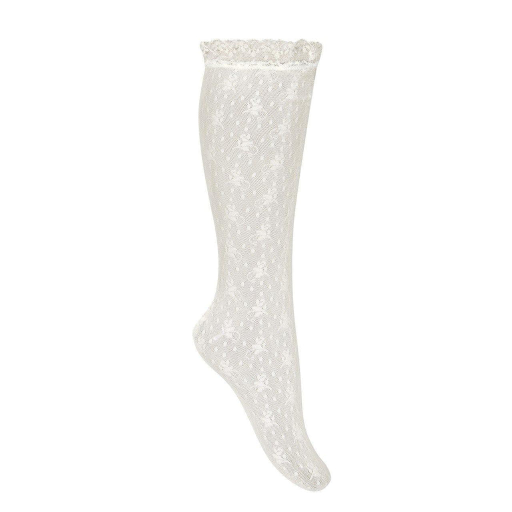 Close-up of Condor girl's Spanish lace knee-high socks in white