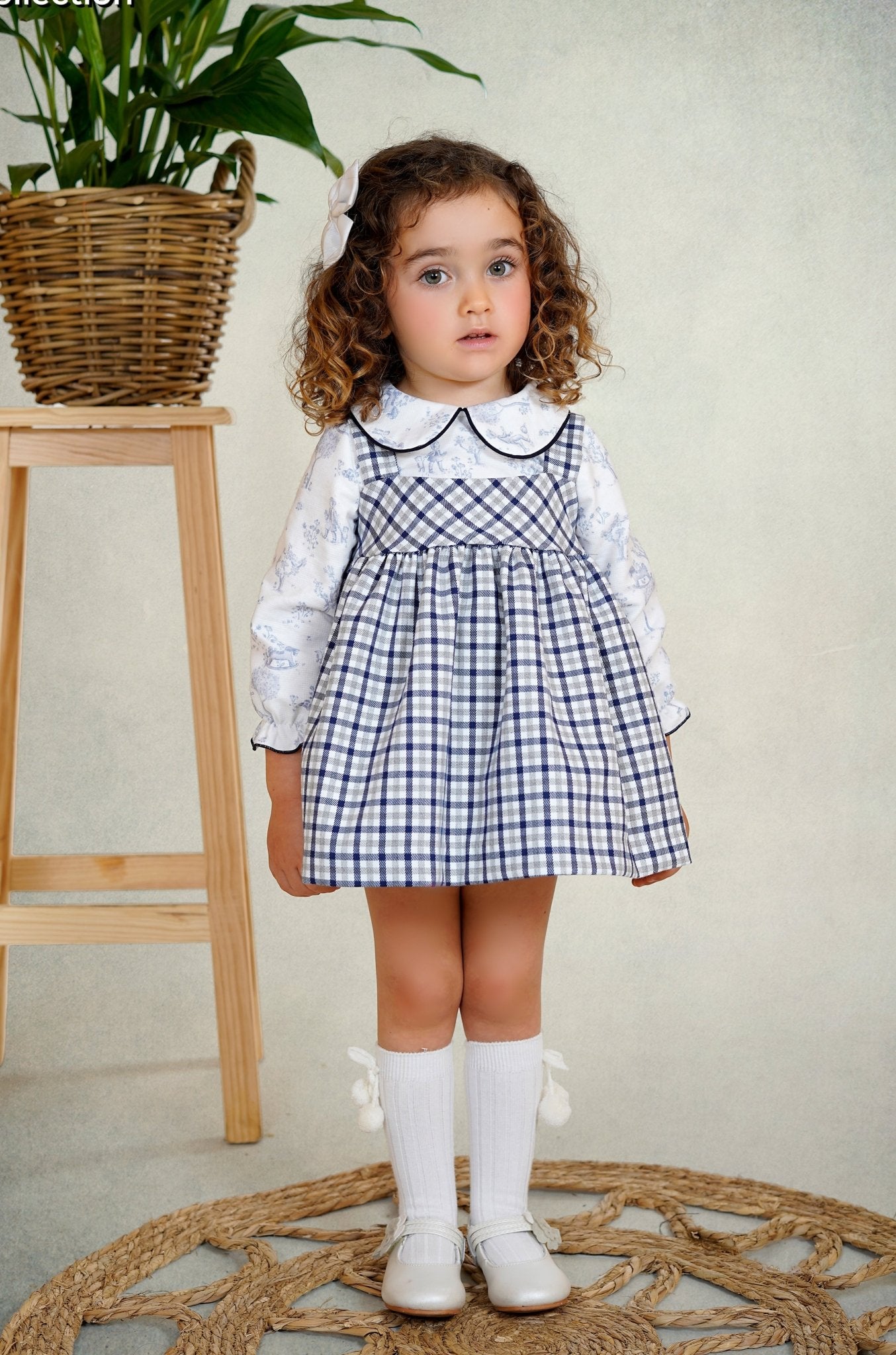 navy gingham pinafore dress  & woodland print blouse DBB Collection AW25.