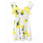Girls lemon print smocked summer dress with yellow bow shoulders.