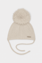 Martin Aranda beige knitted baby pom pom hat with faux fur pom pom made in Spain AW26
