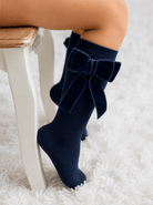Meia Pata girls navy velvet bow knee high socks for the Be Chic Navy AW26 Collection