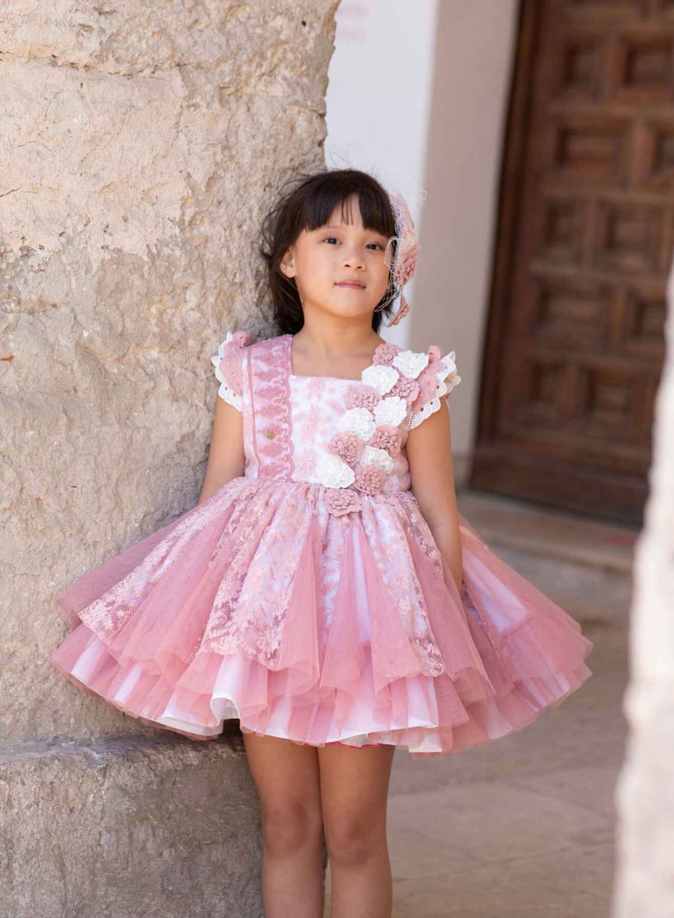 Girls cream and dusky pink occasion dress by Meriche, made in Spain.