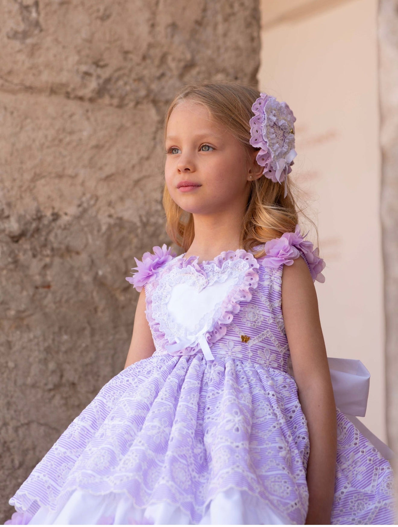 Meriche Alta Costura SS26 girls lilac heart dress with matching headpiece and layered skirt.  Occasion Dress.