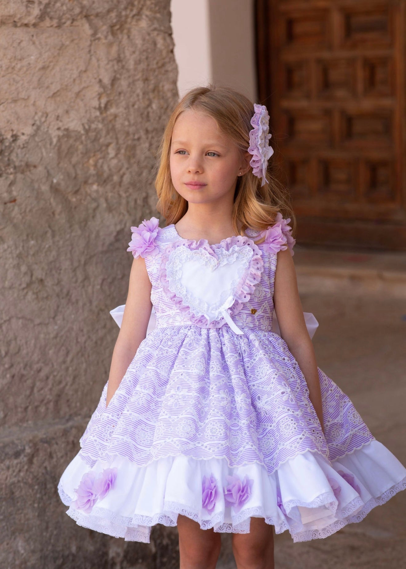 Meriche Alta Costura SS26 girls lilac heart dress with matching headpiece and layered skirt