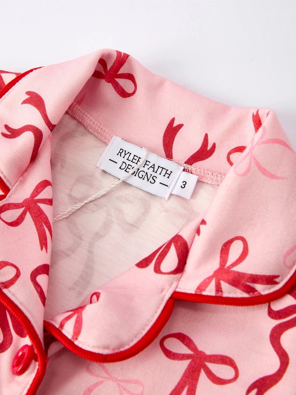 Rylee Faith AW25 - Girls Pink Bow Christmas Pyjamas
