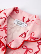 Rylee Faith AW25 - Girls Pink Bow Christmas Pyjamas