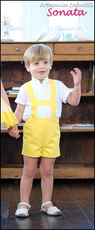 Little Boy wearing yellow H-bar shorts set with cream shirt by Sonata Infantil, Spanish children's outfit UK