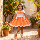 Smocked Orange dress by Sonata for SS26 - Baby & Girls puffball Dress. 