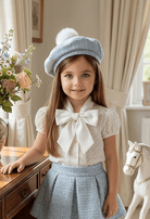 Girls luxury blue Chanel-inspired skirt and jacket set by Sonata with matching hat, SS26 made-to-order occasion wear.