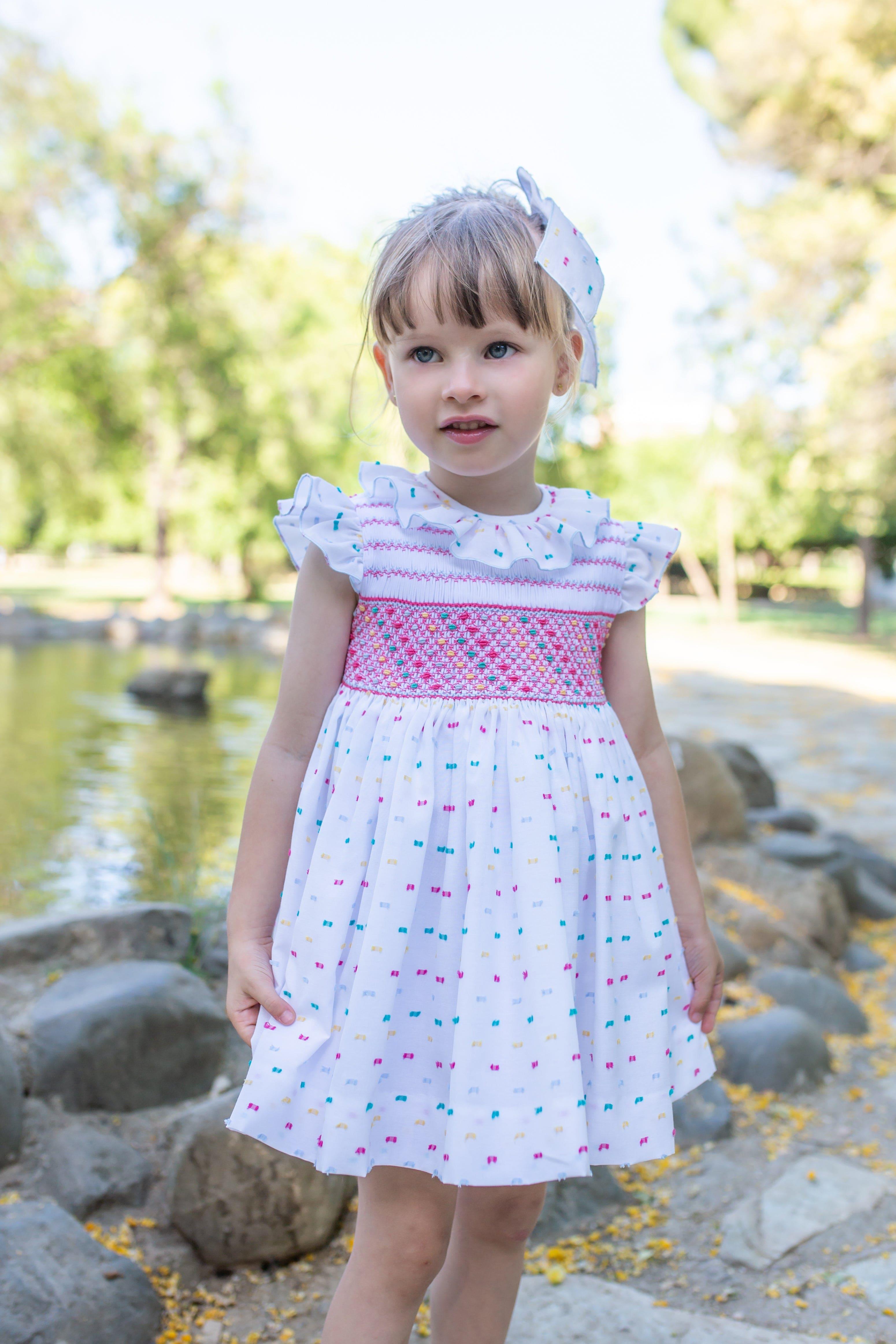 Naxos SS23 - Girls White & Multi Colour Smocked Dress - Mariposa Children's Boutique