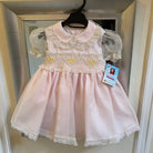 Sonata Girls pink, cream, and lemon smocked dress handmade in Spain 